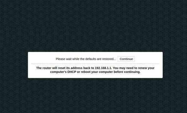 netgear_r7000-please_wait_while_the_defaults_are_restored.jpg