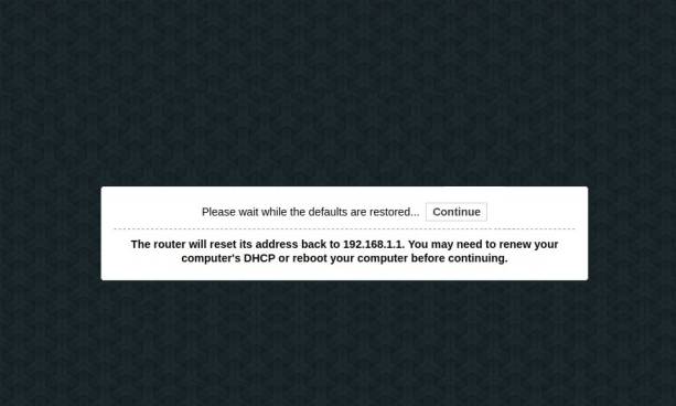 netgear_r7000-please_wait_while_the_defaults_are_restored.jpg