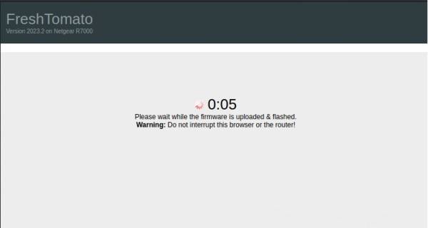 netgear_r7000-please_wait_while_the_firmware_is_flashed.jpg